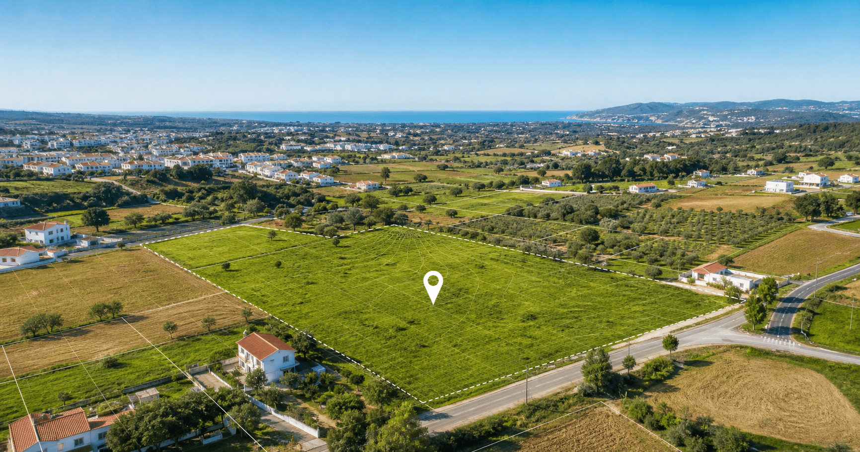 Vista aérea de parcelas e núcleos urbanos para análise do PDM e do mercado
